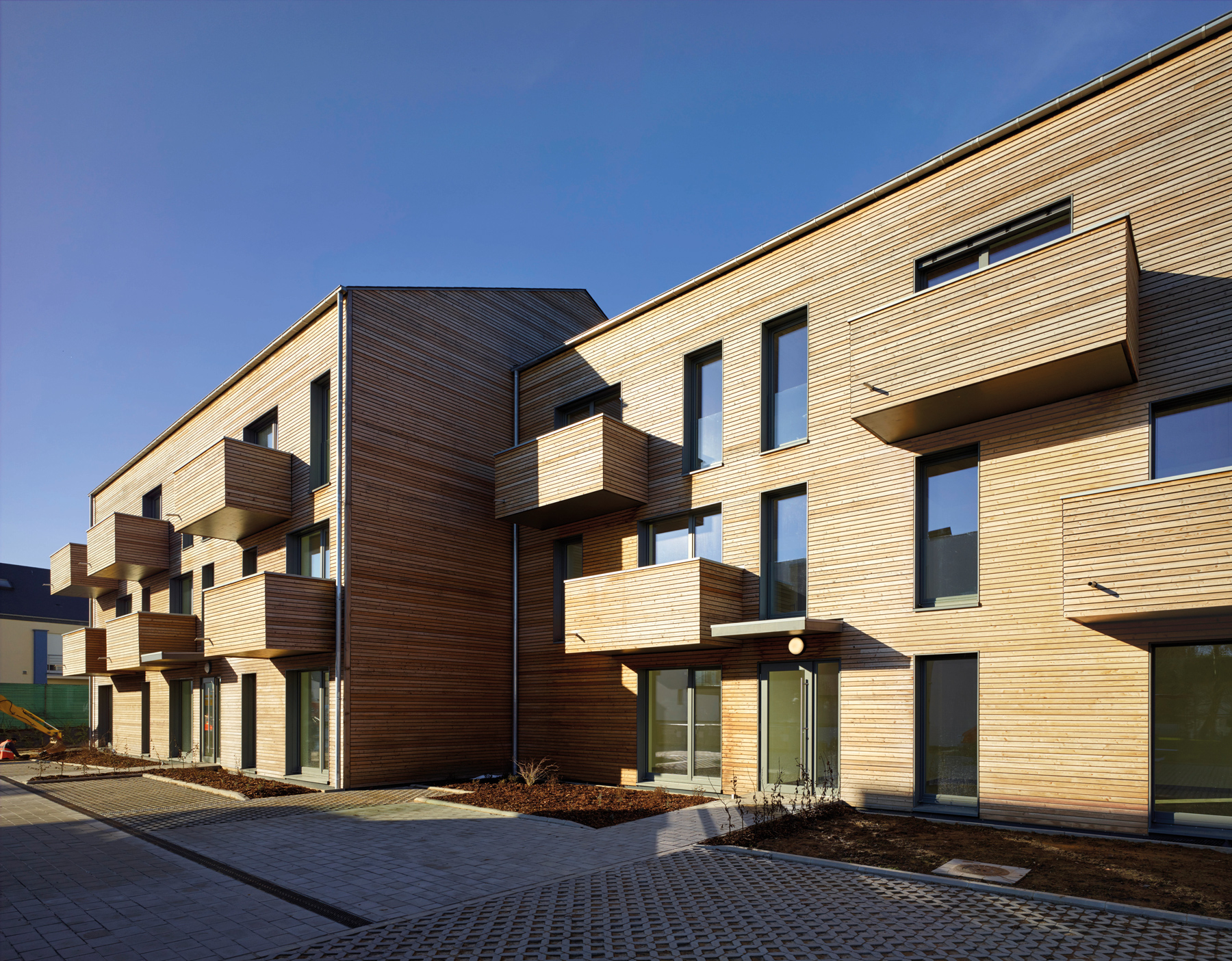 Copyright : Christof Weber IMMEUBLE PASSIF À 14 APPARTEMENTS SOCIAUX