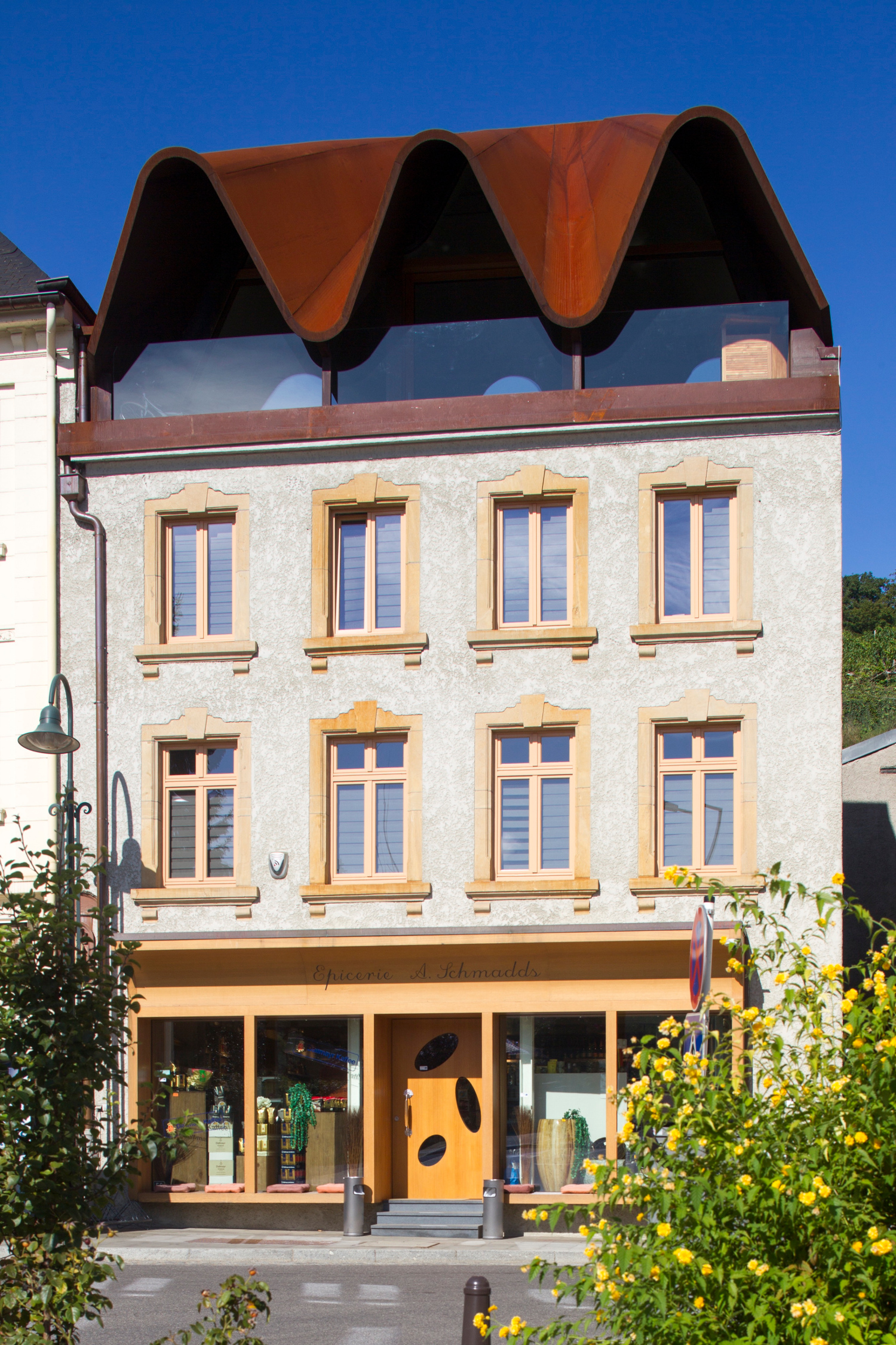 Copyright : VALENTINY HVP ARCHITECTS Épicerie et Maison d'habitation